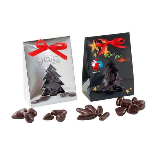 Gourmandises dans une boîte avec un arbre de Noël