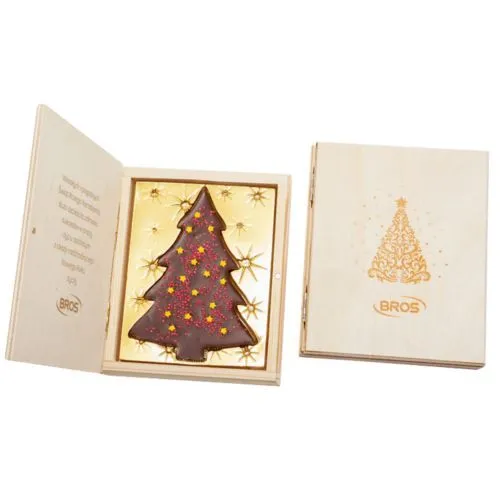 Arbre de noël décoré dans une boîte en bois