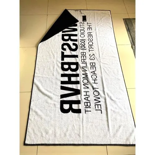 Serviette jacquard personnalisée en fils teints - Logo tissé sur mesure