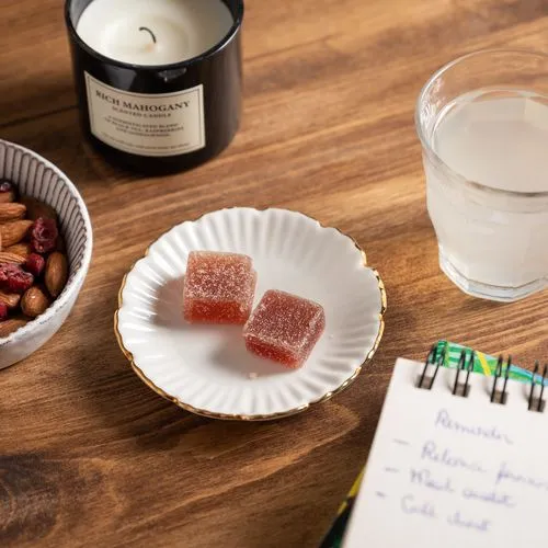 Dé contenant 1 Pâte de Fruit Pêche de Vigne