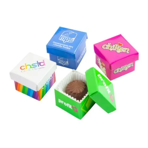 Pralines dans des boîtes à cadeaux