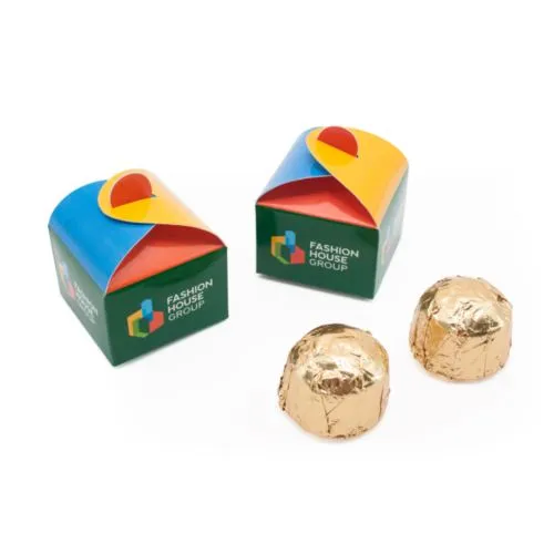 Chocolats dans des boîtes avec titulaire